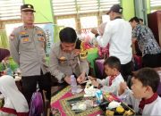 Polres Banyuasin bagikan 400 porsi makanan bergizi ke siswa