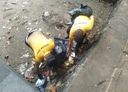 Polsek Kawasan Pelabuhan Gilimanuk Ikuti Kerja Bakti Peringati HUT ke-56 GKPB Jemaat Agape