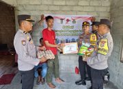 Polsek Poso Pesisir Selatan Berbagi Sembako di Hut Bhayangkara ke 79