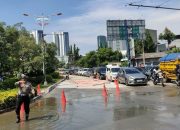 Banjir di lampu merah Ring Road Puri Kembangan Jakbar sudah surut