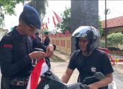 Brimob Polda Banten Bagikan 1.500 Bendera Merah Putih Sambut HUT ke-80 RI