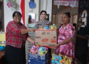 Satgas Humas Operasi Damai Cartenz 2025 Tebar Kasih di Sekolah Minggu GKI Betlehem Kotaraja