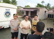 Sinergi Kepedulian: 5.000 Paket Makanan Bergizi Dibagikan, Deputi BGN RI Tinjau Lokasi Banjir di Tanjung Beringin