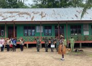 Antusiasme Tinggi Warnai Upacara Hardiknas di SD Naena Kekwa Bersama Satgas TMMD Kodim 1710/Mimika