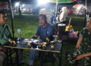 TNI – POLRI Turut Mengamankan Kegiatan Pasar Malam – Hoya – Hoya Di Desa Tanjung Padang, Kec. Sirenja, Berjalan Lancar , Aman, Dan Kondusif
