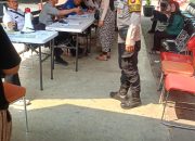 Penyaluran Beras Bulog Hari Ketiga di Tanah Tinggi Dikawal, Antrean Warga Tetap Tertib