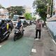 Anggota Polsubsektor Monas Timur Polsek Metro Gambir Tingkatkan Pengaturan Lalu Lintas Sore Hari di TL Batu Gambir
